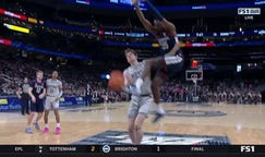 Samson Johnson throws down an alley-oop off an inbounds play, extending UConn's lead vs. Georgetown